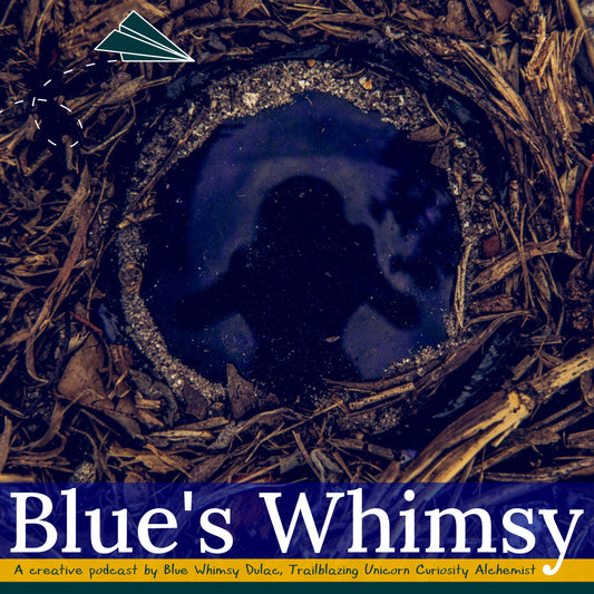 Broken blue glass bottle bottom in sand and mulch with photographer reflection; graphic of green paper airplane top left; text that reads Blue's Whimsy A creative podcast by Blue Whimsy Dulac, Trailblazing Unicorn Curiosity Alchemist